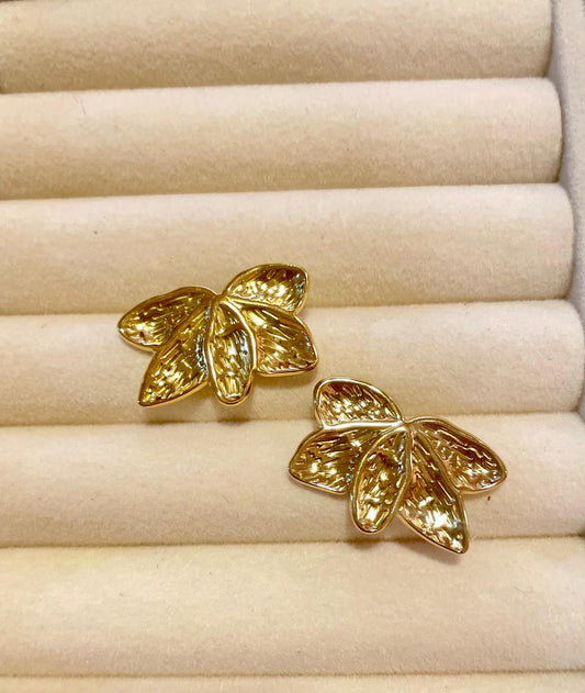 Aretes media flor